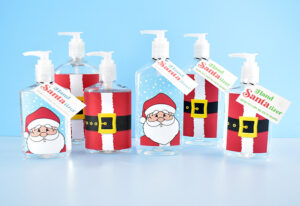 Looking for a great Christmas gift during COVID that isn't food? Download and print our free Hand Santa-tizer labels for fab DIY gifts!