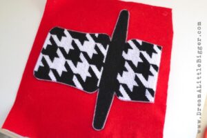 This plastic canvas clutch tutorial is easy to follow and makes a super cute bag just to your style for around SIX bucks. How cool is that?