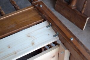 Turn an unused headboard and foot board into a fabulous front porch bench!