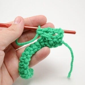 Add fun texture to your crochet pieces with only single and double crochets! Check out the Cable Crochet Stitch! Pictorial and video tutorial!