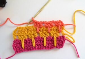 The larksfoot crochet stitch is made up of double crochets and chains. Super easy but lovely pattern.