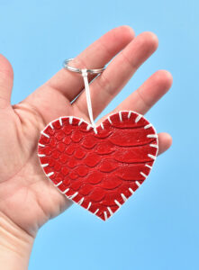 Looking for a non-food DIY Valentine's Gift that is super useful? Check out this Easy Valentine Heart Key Chain tutorial!