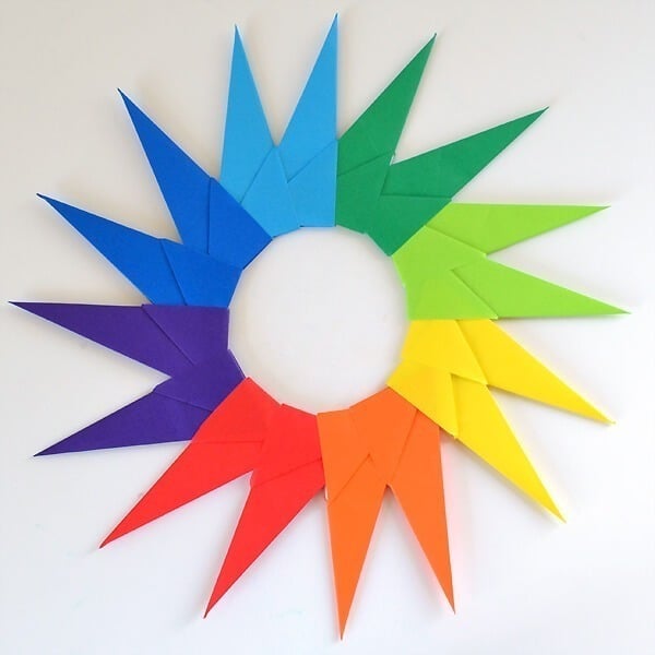 Even beginner folders can make these gorgeous 16 point origami stars. Love the rainbow!