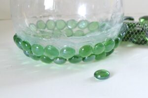 A $1 candle holder and $2 worth of glass gems become something beautiful!