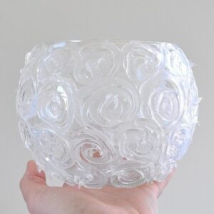 This gorgeously textured swirl candle holder is brilliant when lit! It might surprise you what it's made out of!