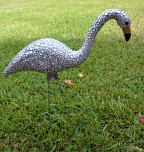 This blinged out flamingo is a totally unique garden accessory you can whip up yourself. You just need the right glue to make it work out!