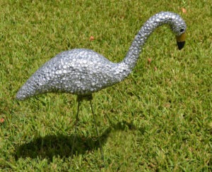 This blinged out flamingo is a totally unique garden accessory you can whip up yourself. You just need the right glue to make it work out!