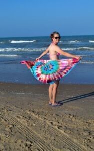 Have the most unique beach towel by the water! These DIY tie dye beach towels are easy, fun and so colorful!