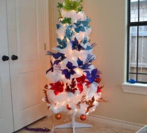 This rainbow ombre Christmas tree is so pretty and so easy to copy! Love all of the colors on a white tree!