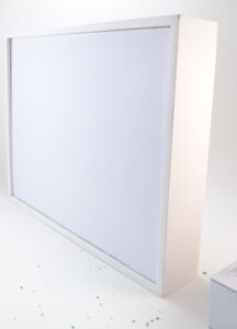 This winter twinkle light display is so pretty! Make your own with bottle brushes, buffalo snow and a shadow box. Full tutorial!