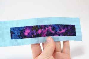 Make a galaxy cuff bracelet with this galaxy cross stitch pattern.