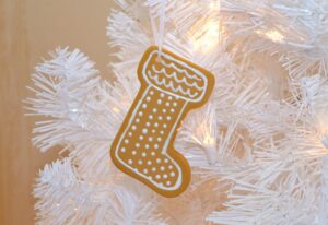 These iced cookie ornaments will make your tree super sweet and last for years. See how to turn ceramic blanks into fantastic cookie ornaments!