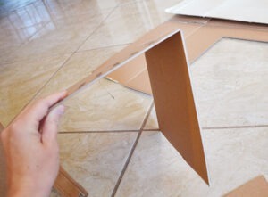 Give kitty something to purr about with their own cardboard cat mansion from upcycled materials!