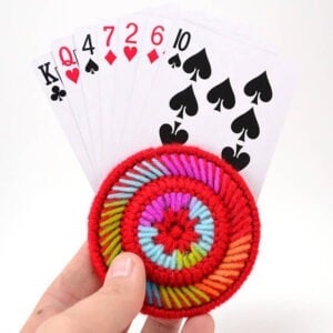 Have trouble holding cards? These plastic canvas playing card helpers are fun to make, cute to look at and keep your hands from cramping while playing gin!