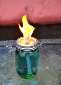 I am in love with these mason jar citronella torches. So easy and so inexpensive for so much charm!