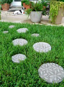 Curious how to make stepping stones? These gorgeously embossed stepping stones are deceptively simple to make and create the prettiest paths!