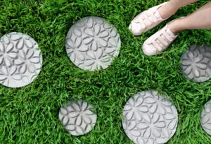 Curious how to make stepping stones? These gorgeously embossed stepping stones are deceptively simple to make and create the prettiest paths!