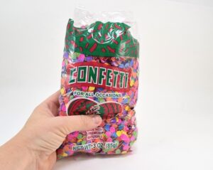 Make confetti wall art to inspire you to be happy or kind! I love this colorful reminder :)