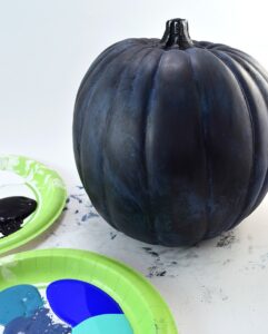 Make a galaxy pumpkin and have one truly out of this world jack-o-lantern!