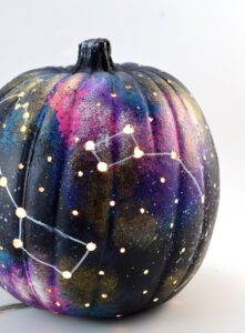 Make a galaxy pumpkin and have one truly out of this world jack-o-lantern!