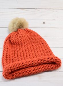Did you know how easy it is to loom knit a hat? It looks properly knit, too! I'm making a ton as gifts!