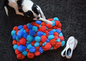 Turn yarn into a fluffy pom pom rug. It's easy and super affordable and oh, so FLUFFY!