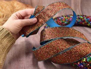 Wow! You can make a pretty ribbon bow in just a few minutes. This is the easiest way I've seen, yet!