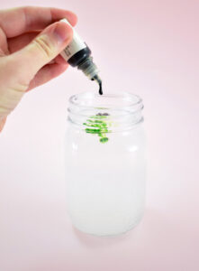 Add 2-3 drops of liquid food coloring or liquid soap colorant.
