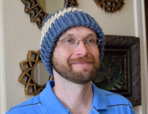 Make caps a bit warmer with a double-thick brim. It's so easy to loom knit a brim cap!