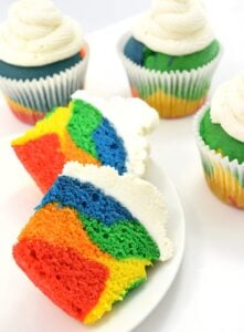 Rainbow cupcakes don't have to take forever... these are quick! And there is a recipe for that grocery store bakery kind of frosting that dries hard!