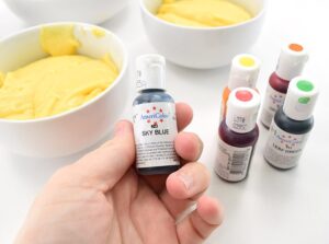 Rainbow cupcakes don't have to take forever... these are quick! And there is a recipe for that grocery store bakery kind of frosting that dries hard!