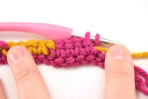 The checkerboard crochet stitch makes a nice, thick fabric and that pattern is amazing. And it's so much easier to do than it looks!