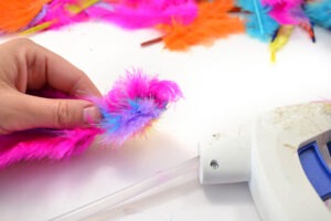 If your kitty loves feathers, and what cat doesn't, she's going to LOVE these DIY feather toys you can make from her. So much sturdier than store bought and cats love homemade!