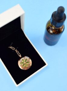Keep mosquitoes away without a greasy spray. This custom mosquito repellent essential oil blend is easy to make and works perfectly in an essential oil pendant. This pretty mosquito repelling necklace is functional and gorgeous!