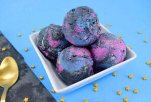 Impress guests with this super easy, no churn/ice cream maker galaxy ice cream. Make grape or the flavor of your fave fruit juice... it's out of this world!