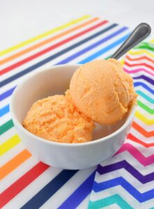 Sweet and creamy with a little bit of a tang, this mandarin orange ice cream doesn't require an ice cream machine and hits the spot on a hot summer day!