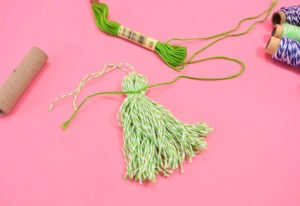 These 5 minute baker's twine tassels are so adorable and cost about 33 cents apiece - seriously why buy when DIY is so cheap?!?