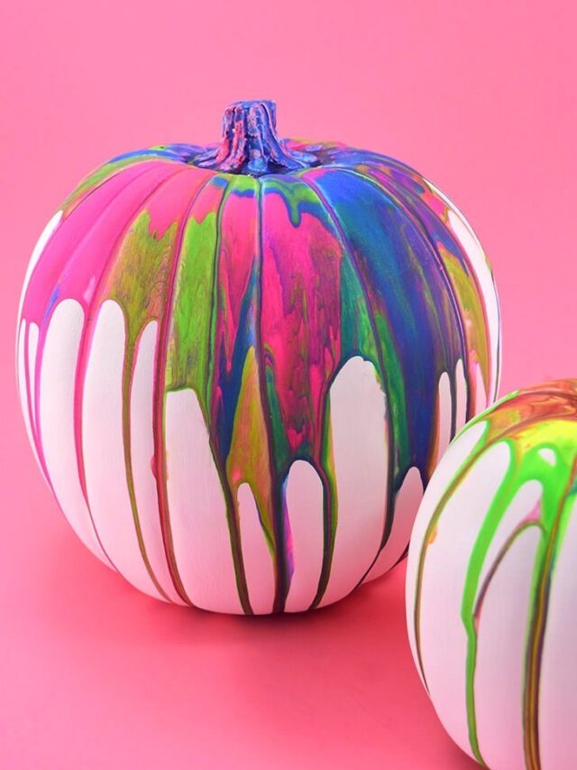 These colorful, drippy no carve pour art pumpkins are super easy and use washable paint making it the perfect Halloween kid craft! Click through for a few tips and tricks so you can achieve pretty results!