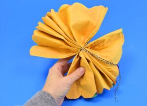 Can you believe these gorgeous flower pompoms are made out of tissue paper? Simple to make and super cheap these tissue paper pompoms are a super craft!