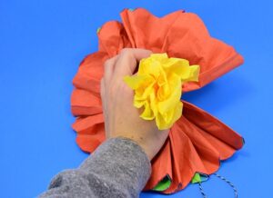 Can you believe these gorgeous flower pompoms are made out of tissue paper? Simple to make and super cheap these tissue paper pompoms are a super craft!