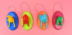Fun and colorful, these faux taxidermy Christmas ornaments are the perfect way to add a little cute and quirky to your Christmas tree!