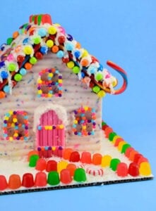 Is this not the sweetest little Christmas thing you've ever seen? These chocolate "gingerbread" style candy houses are perfect for the holidays. They can easily be gluten free, too!