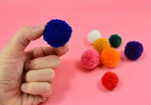 Get in the kitchen and bust out the cutlery and let's make some fork pompoms. Did you know you can make pompoms with a fork? They're absolutely adorable and a great way to bust that yarn stash!