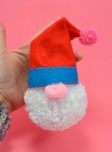 Some yarn and felt will make the cutest pompom gnomes. Great as fun decor items or Christmas ornaments!