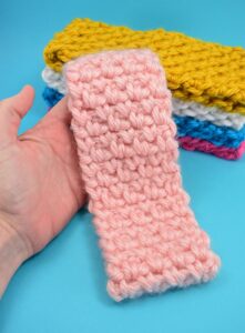 Keep your ears toasty with this inexpensive DIY. This thick and quick pattern whips up the cutest stretchy ear warmer that will fit any size head!