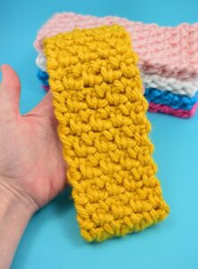 Keep your ears toasty with this inexpensive DIY. This thick and quick pattern whips up the cutest stretchy ear warmer that will fit any size head!