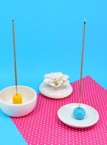Quickly and easily make this DIY incense burner that catches the mess and can easily be made to hide it away for later clean up, too!