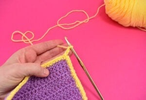 Want to surround your crochet project with a fun frill with ease? This crochet ruffle could NOT be easier and it doesn't matter how many stitches you have!