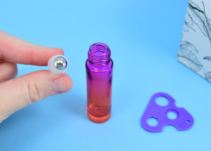 Tired of getting nauseous in the car or seasick? Easy to use, this motion sickness essential oils roll can make travel more fun without medication!