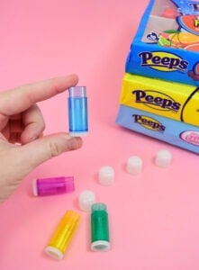 Love Peeps? Easily make marshmallow flavored lip balm at home, reminiscent of your fave spring candy with this simple to follow tutorial!